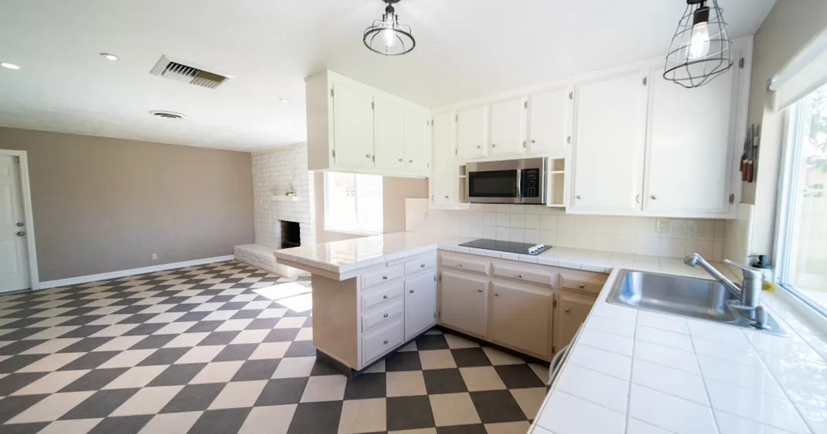 Kitchen floor with tile and sink